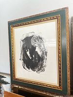 Front view of framed Sandu Liberman lithograph