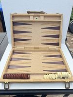 open Hoyle backgammon case showing board and pieces