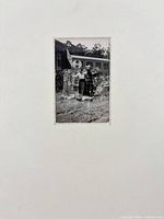 Overall view of matted photograph showing subject and mat