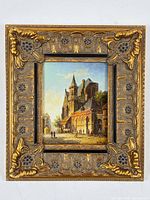 Framed oil on board Dutch town scene signed J. Musick