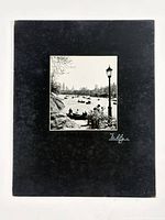 Front view showing entire mounted photograph with border and signature