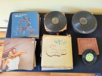 Overview of LPs, two stacks of 78s, Chicago album, Don McLean cover visible