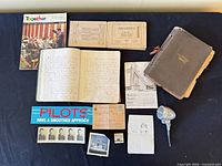 overview showing all ephemera, books, photographs and microphone