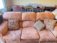 Front view of sofa with all three throw pillows