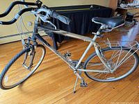 Full view of Giant Cypress bicycle showing frame, wheels, handlebar, rack and kickstand