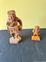 Both figurines side by side for scale comparison