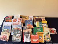 Overhead view of all cookbooks laid out on table