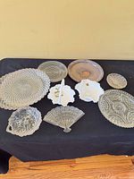 Group shot of all 10 pieces displayed on table