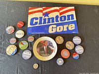 Overall lot showing Clinton Gore sign, Obama plate and multiple campaign buttons