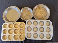 All five bakeware pieces laid out