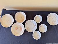 Group shot of all eight porcelain pieces