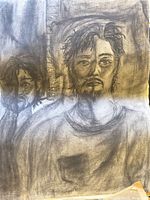 Charcoal portrait of bearded man, visible paper texture