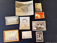 Overview of all nine photographs laid out on dark surface