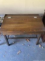 Closed top view showing dark brown finish and hinges