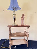 Table, lamp, figurine full view
