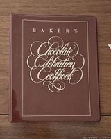 Front cover of maroon binder showing title