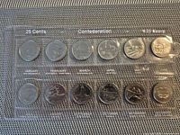 Front of sealed plastic sleeve showing all twelve commemorative quarters labelled January–December