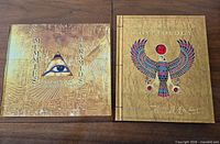 Front covers of both oversized hardcover books showing titles and Egyptian artwork
