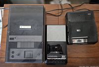 Three cassette recorders side by side on table