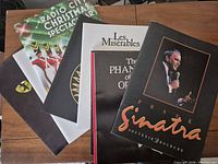 All six programs overlapping on table