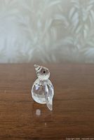 Close-up of crystal penguin figurine