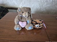 Both plush toys on table