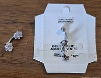 Both barbells; one on retail card, one loose