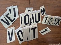 Spread of multiple Snap-Stix adhesive character sheets on tabletop