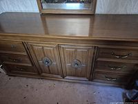 front view of dresser with mirror showing overall style and finish