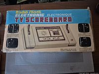 Retail box top showing Radio Shack Electronic TV Scoreboard branding