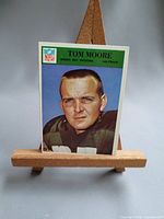 Front view of Tom Moore card on easel