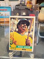 Front view of 1976 Topps Reggie Jackson #500 card in sleeve