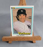 Front view of 1981 Donruss #351 Yogi Berra card on easel