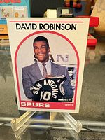 Front view of the David Robinson #138 NBA Hoops card on stand