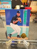 Front view of 1993 Classic Four Sport Alex Rodriguez card showing gold foil seal and card design