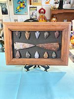 Full framed display on easel showing all mounted points