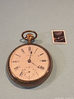 Front view showing dial, case, and size reference stamp