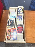 Top view of long card storage box filled with hockey cards