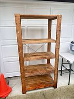 Front view showing full height and five shelves