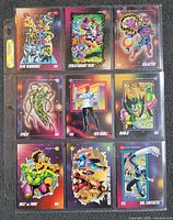 Front view of nine cards in binder sleeve