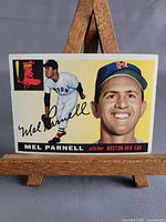 Front of 1955 Topps Mel Parnell card on small easel