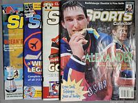 Group shot of four consecutive Canadian Sports Collector issues