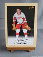 Full view of Gordie Howe Bee Hive print card on display stand
