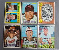 Front view of all six 1967 Topps baseball cards showing player images and titles