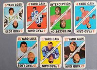 Seven 1971 Topps Game football cards laid out showing fronts and yardage/play text