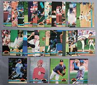 Fronts of roughly half the cards displayed in rows showing action photography and Stadium Club logo