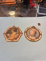 Both miniature framed prints side by side