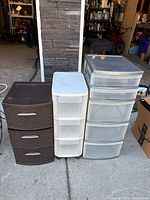 Front view of three plastic drawer units: brown 3-drawer, white 3-drawer, gray 5-drawer