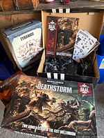 Overview of boxed sets, rulebook, loose minis and bases