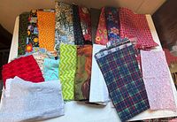 Overview of all fabric pieces spread on table